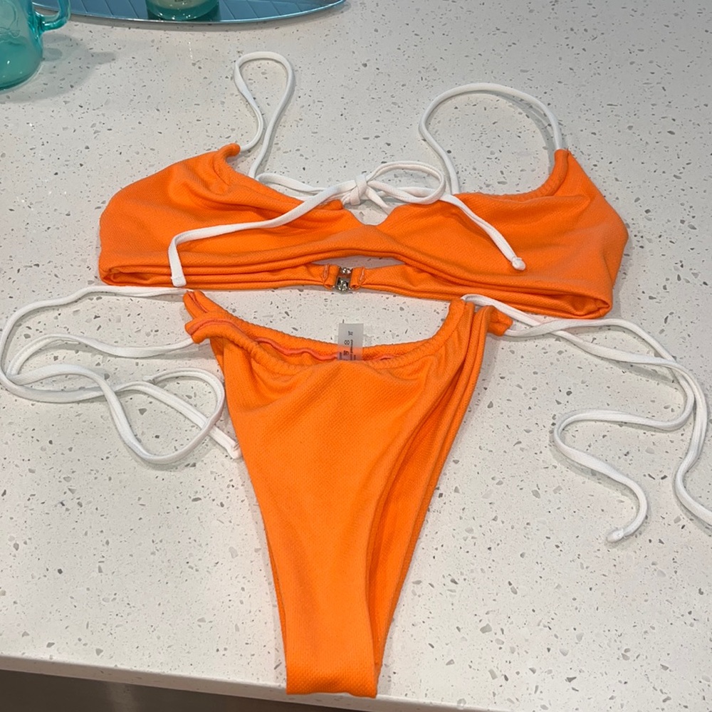 Very sexy orange 🍊 string bikini never worn !!